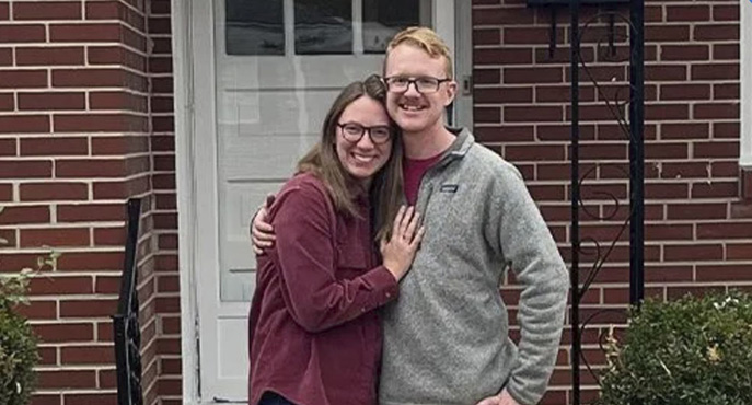 picture of Matthew H. in front of a house