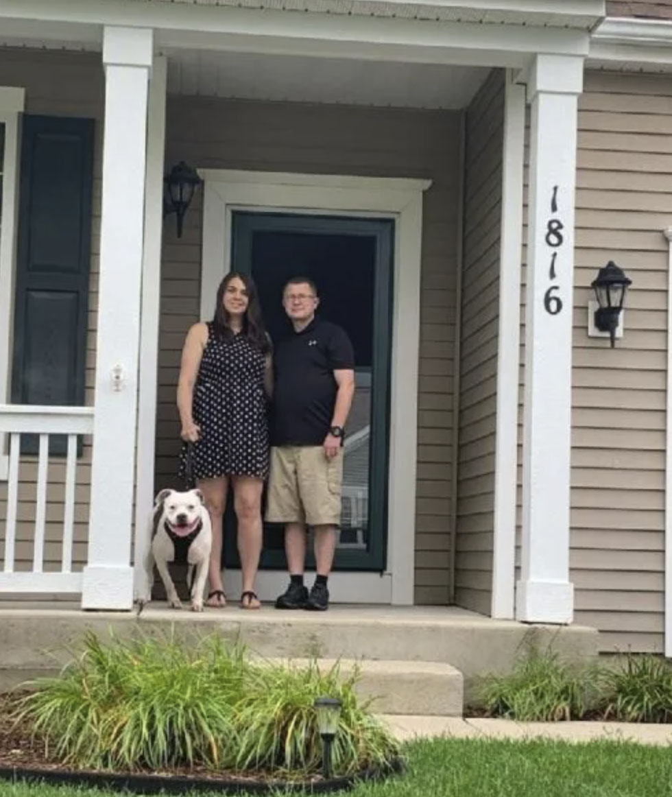 picture of Patrick T. in front of a house